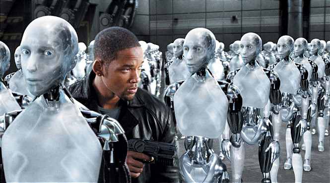 영화 ‘아이, 로봇’의 한 장면, 주인공이 일렬로 세워진 로봇들 사이에서 서성이고 있다.