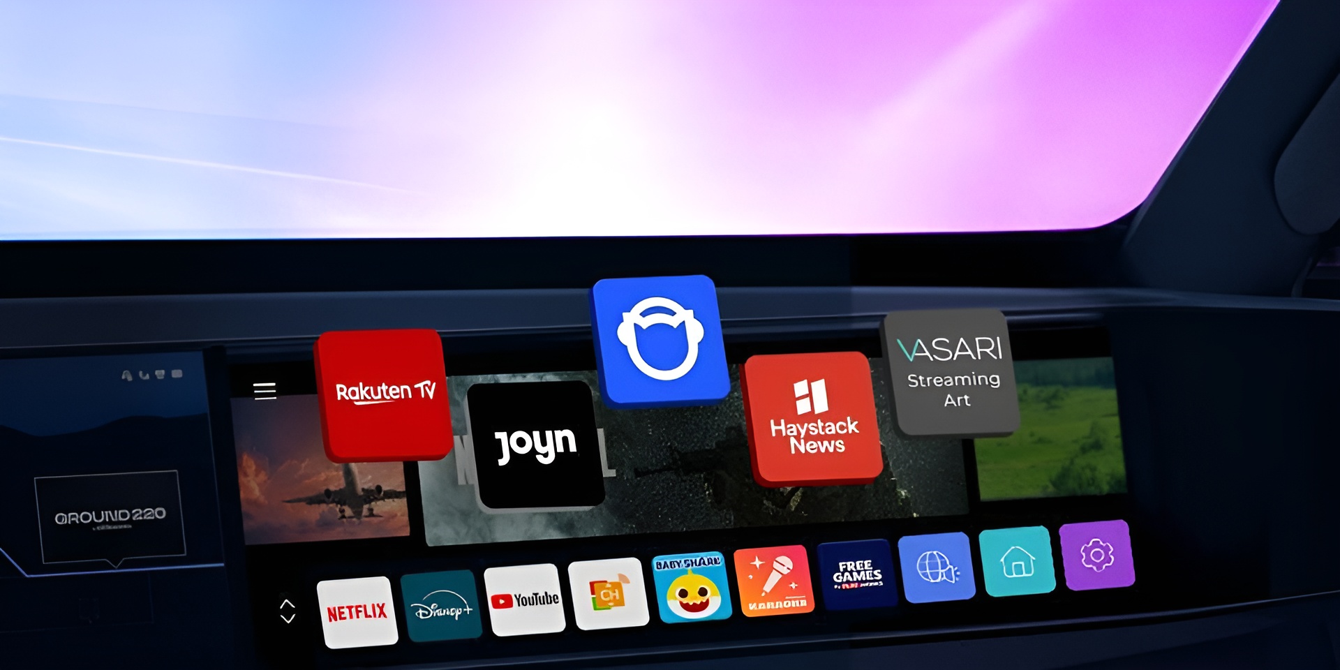 자동차 내부 대시보드 디스플레이 화면이 보이며 다양한 엔터테인먼트 및 앱 아이콘이 배열되어 있다. 화면에는 Rakuten TV, Joyn, Haystack News, Vasari Streaming Art 같은 앱 아이콘이 중앙에 떠 있고, 하단에는 Netflix, Disney+, YouTube, Baby Shark, Free Games 등의 아이콘이 나열되어 있다. 화면 배경은 밝은 보라색과 파란색이 그라데이션으로 번져 있으며, 차량 인포테인먼트 시스템을 통해 다양한 미디어 콘텐츠를 즐길 수 있음을 보여준다.